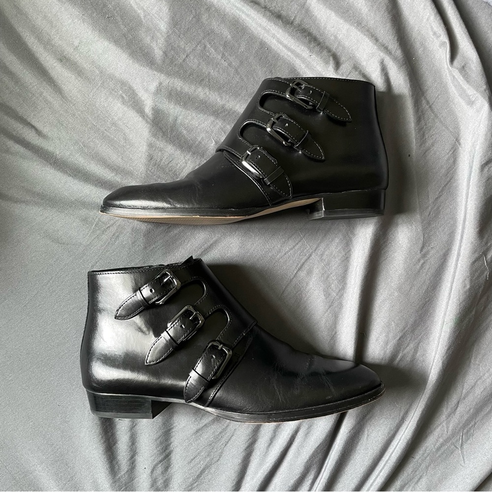 Michael by Michael Kors black leather flat bootie with buckles, size 7 M